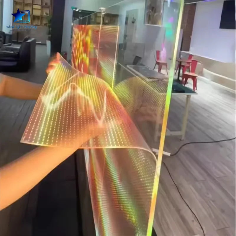 Transparent LED display screen by Starlight-Display with high brightness 1500-6500cd/m², featuring a controller for electronic signage.