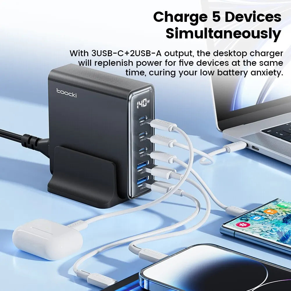 Toocki 140W GaN 5-in-1 desktop charger with LED, fast charging electronics accessory featuring multiple ports for versatile device charging.
