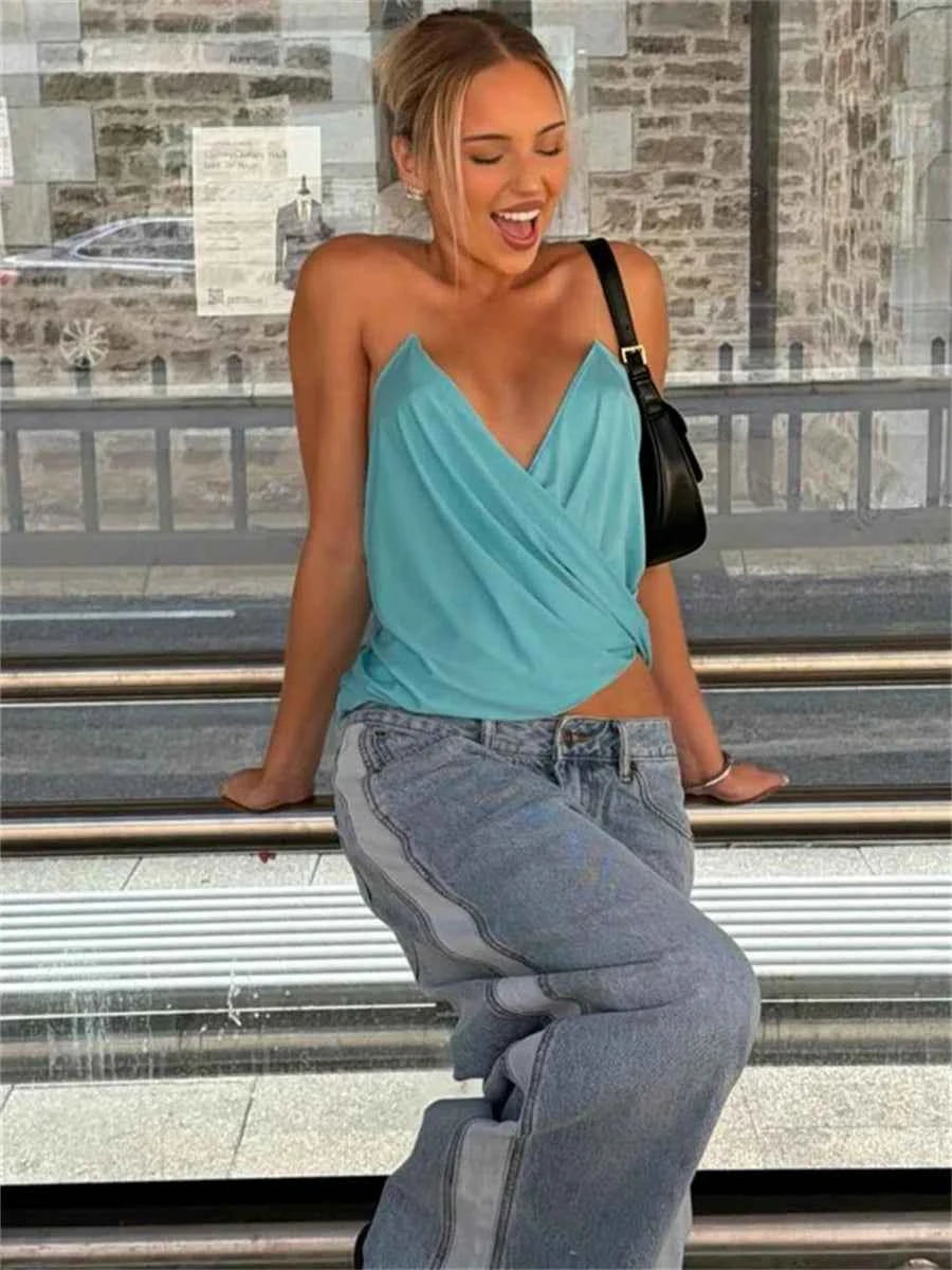Blue sleeveless top by WEIRD PUSS with cross and ruched design, sexy and stylish for women.