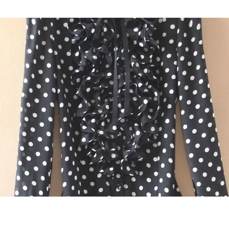 Black bodycon dress for women with white polka dot pattern, short sleeves, and fitted silhouette by Corporación Turística.
