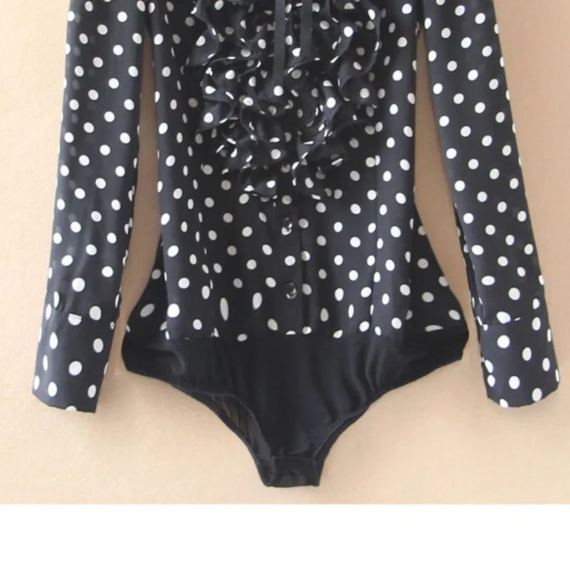 Black bodycon dress for women with polka dot print, featuring a fitted silhouette and long sleeves.