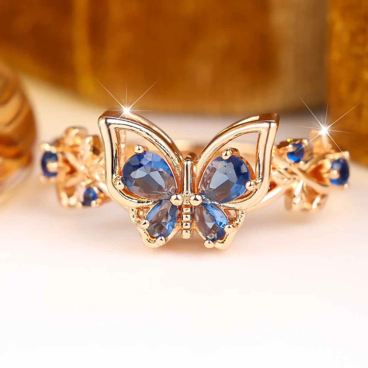 Blue cubic zirconia finger ring for women, silver-tone jewelry with a sparkling blue stone, elegant and stylish accessory.