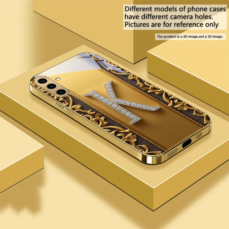 Golden crystal phone case with diamond accents, designed for a stylish and luxurious look on mobile devices.