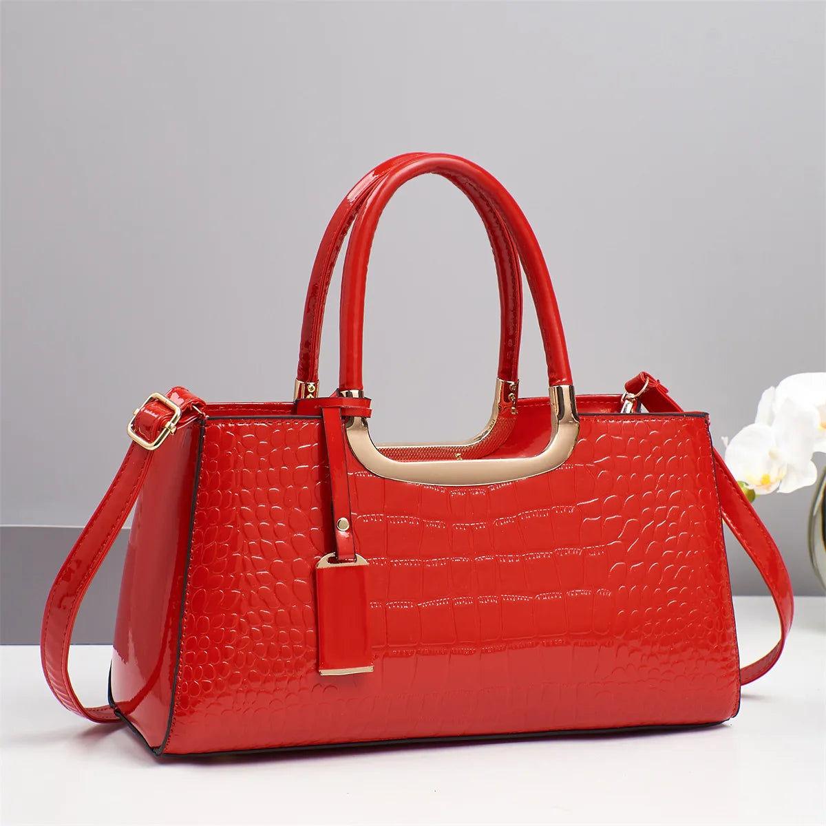 Western-style women's shoulder bag by Corporación Turística featuring leather accents and rustic design details.