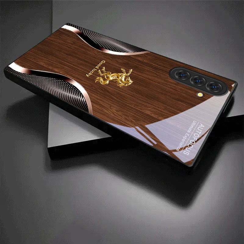 Black crystal phone case with golden steed and fortune design, fits smartphones, designed by Corporación Turística.