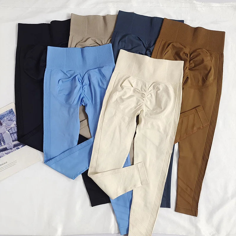 High-waisted women's yoga leggings made of seamless fabric, shown in a neutral color, designed for comfort and flexibility.
