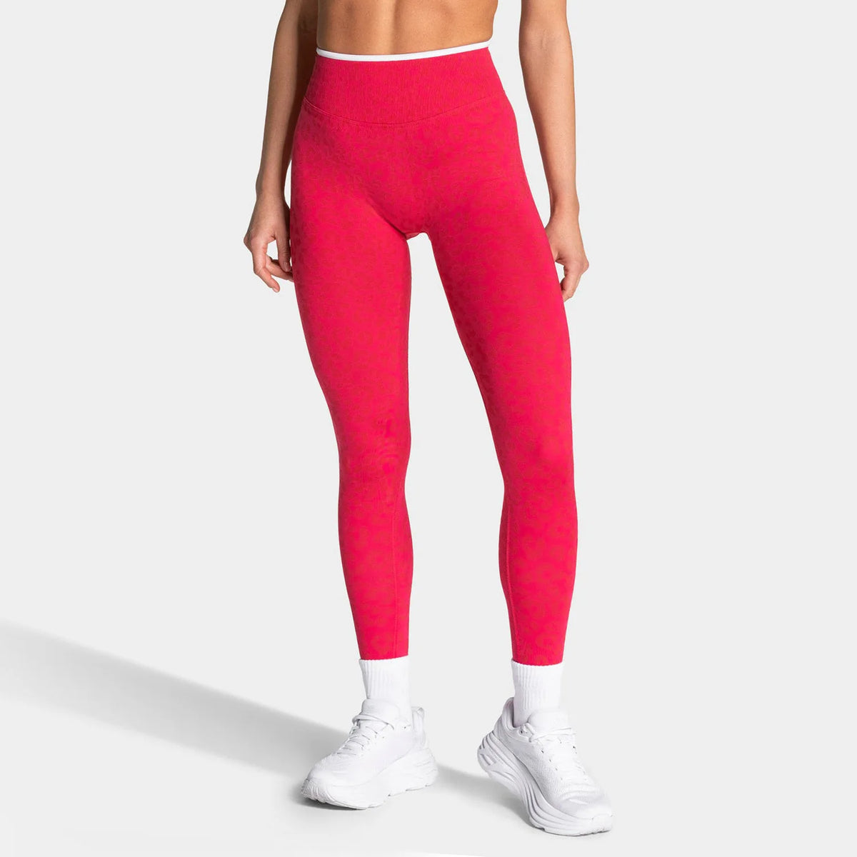 Leopard print women's yoga set by Corporación Turística featuring a fitted top and matching leggings for activewear.