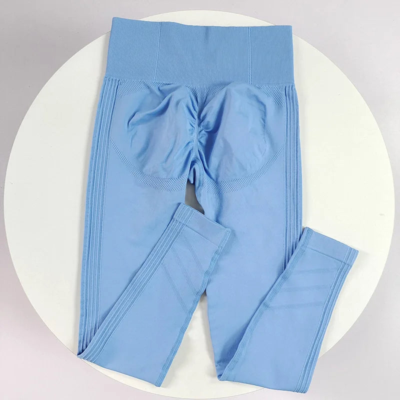 High-waisted yoga leggings for women by Corporación Turística, made from seamless, stretchy fabric for comfortable movement.