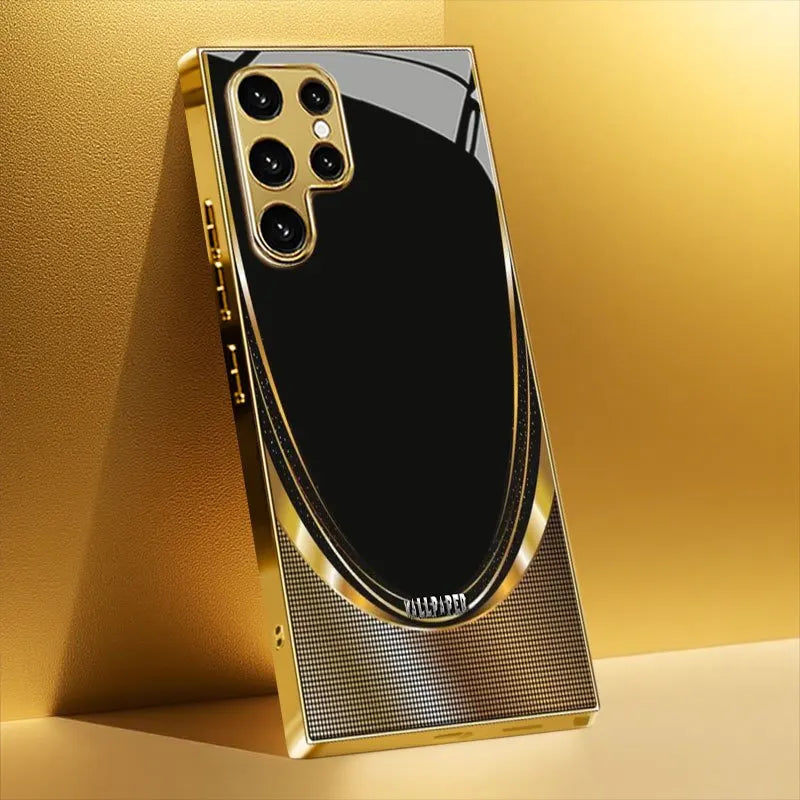 Glass phone case with shiny gold finish, designed to fit smartphones and protect with a stylish, reflective surface.