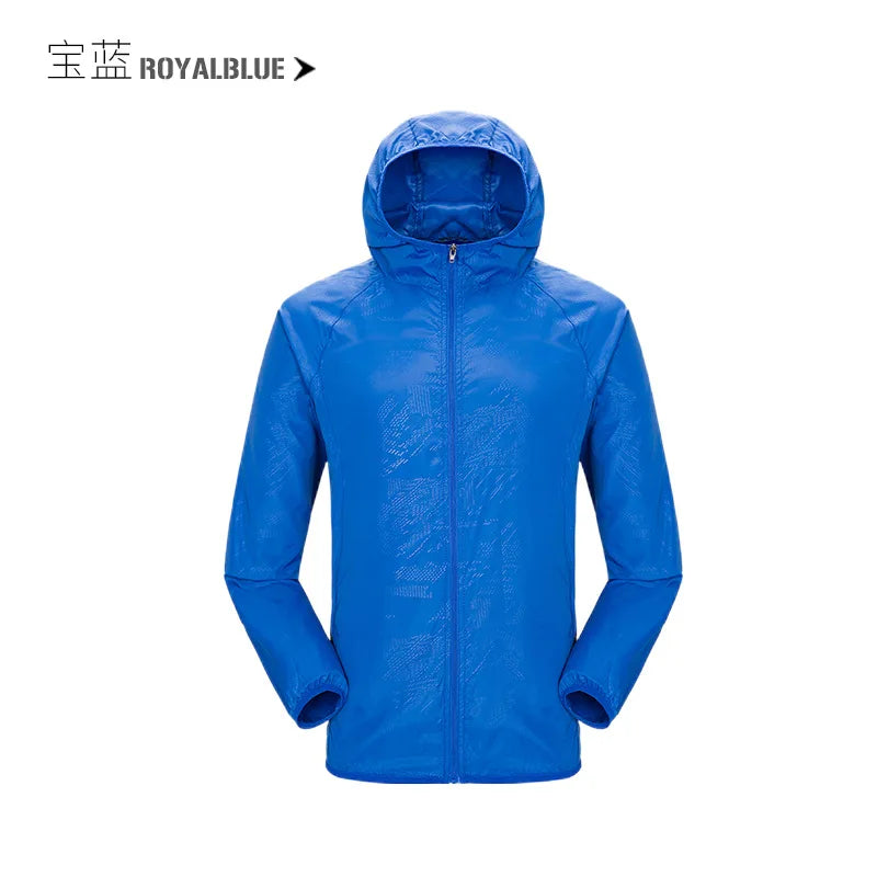 Waterproof camping rain jacket for men and women by Corporación Turística, breathable outdoor rainwear with hood and adjustable fit.