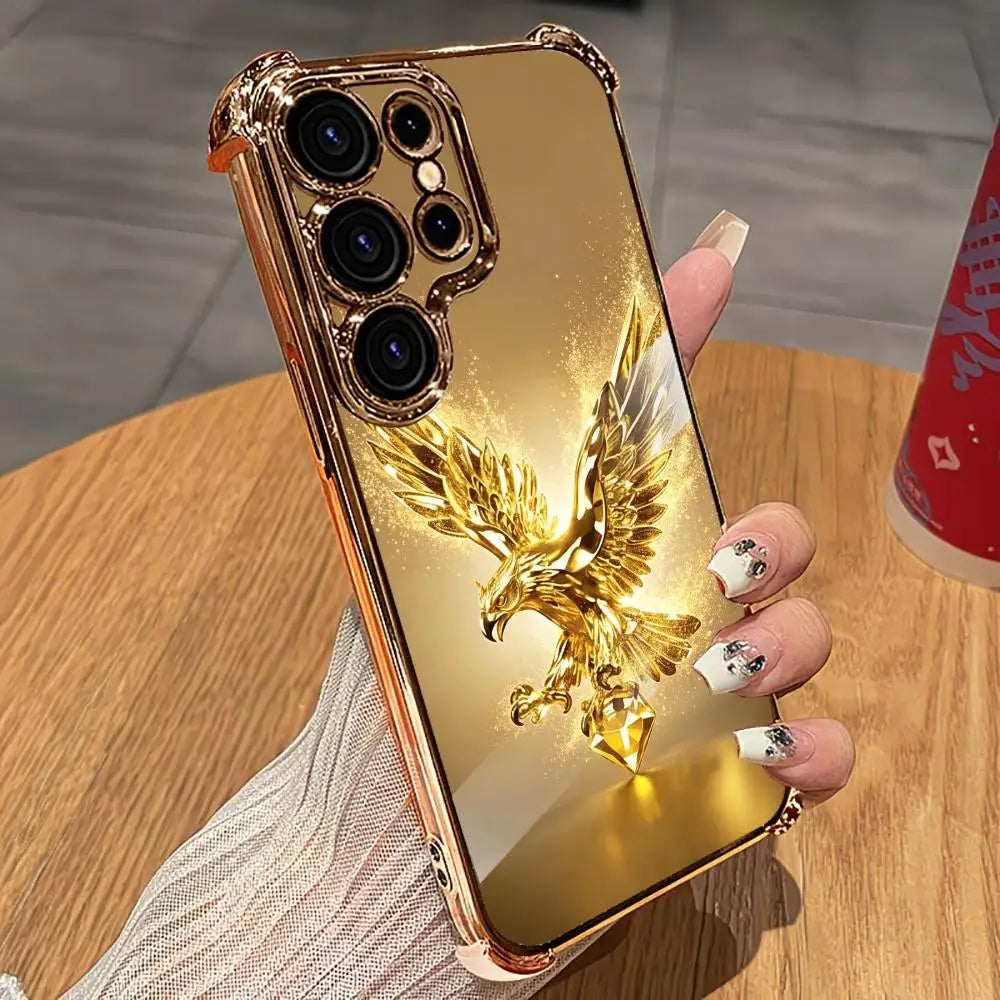 Gold eagle design phone case from Corporación Turística, shiny and protective for smartphones, featuring a detailed eagle motif.