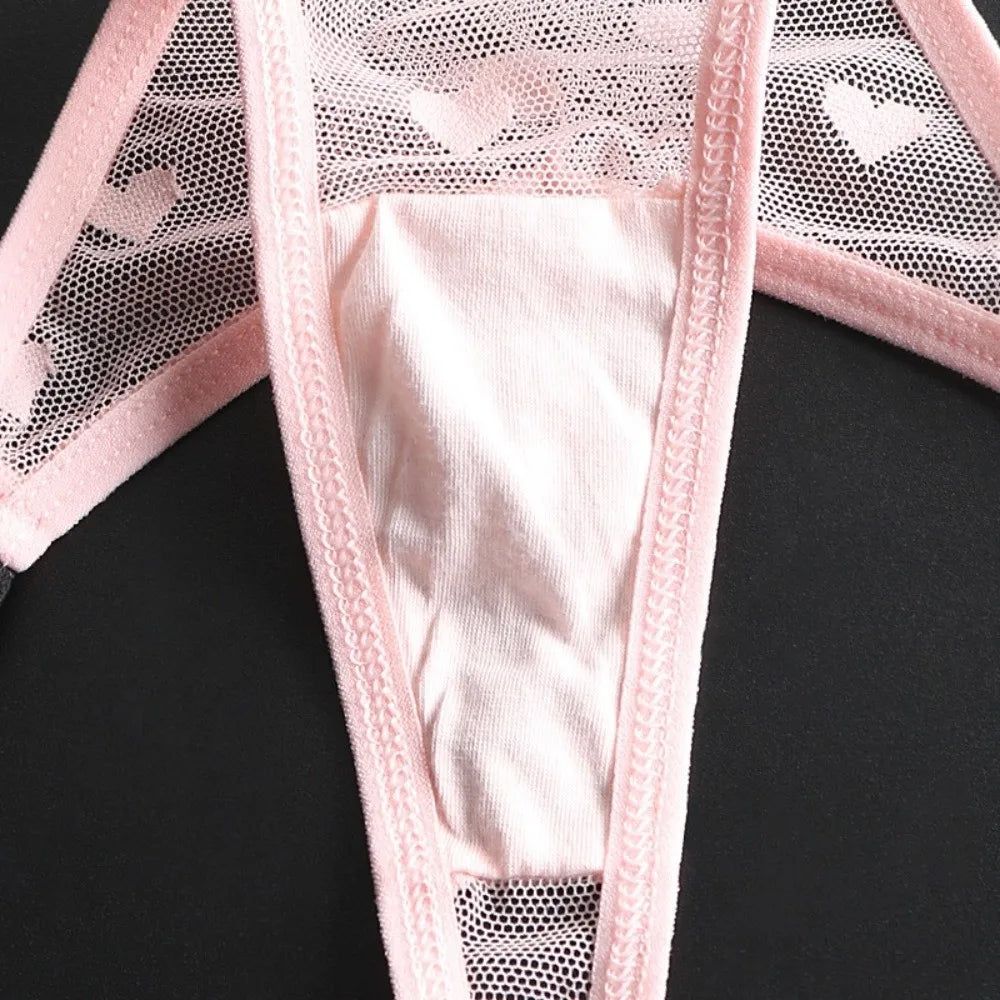 Cotton heart mesh seamless tangas from Corporación Turística, soft, comfortable underwear with delicate heart-patterned mesh fabric.
