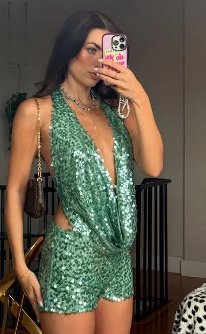 Two-piece sexy sequin set with sleeveless top, featuring shiny silver embellishments, ideal for stylish evening or party wear.