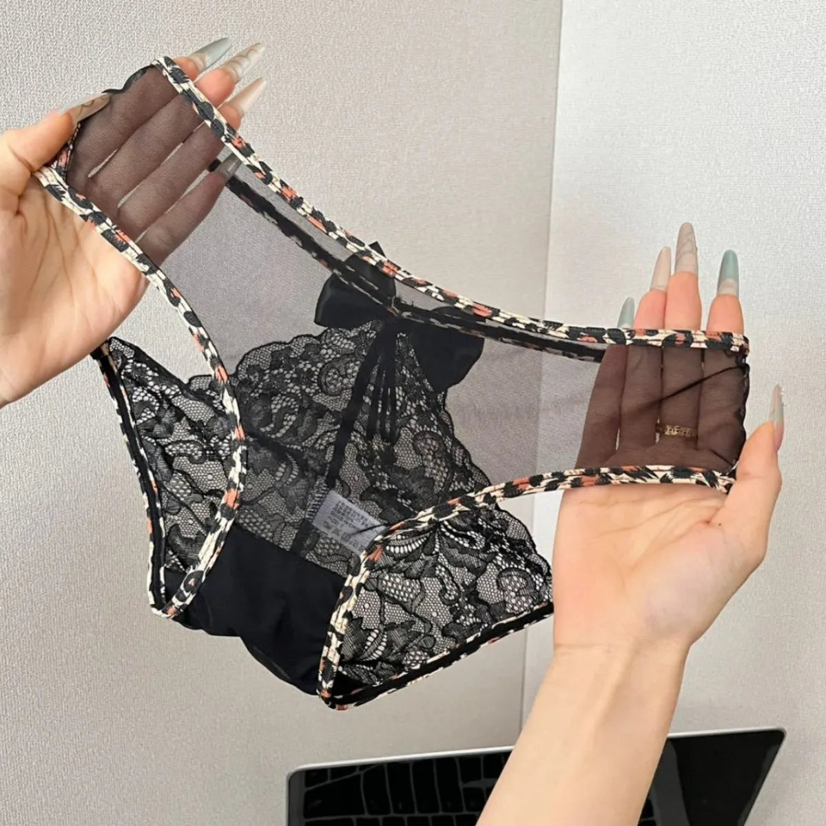 Leopard print lace women's panties featuring a comfortable fit and delicate detailing.