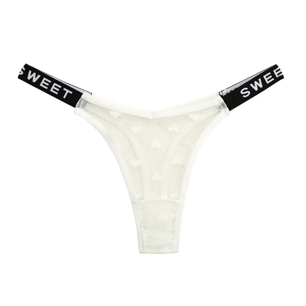Cotton thong with heart mesh design and seamless fit, showcasing soft fabric and stylish details from Corporación Turística.