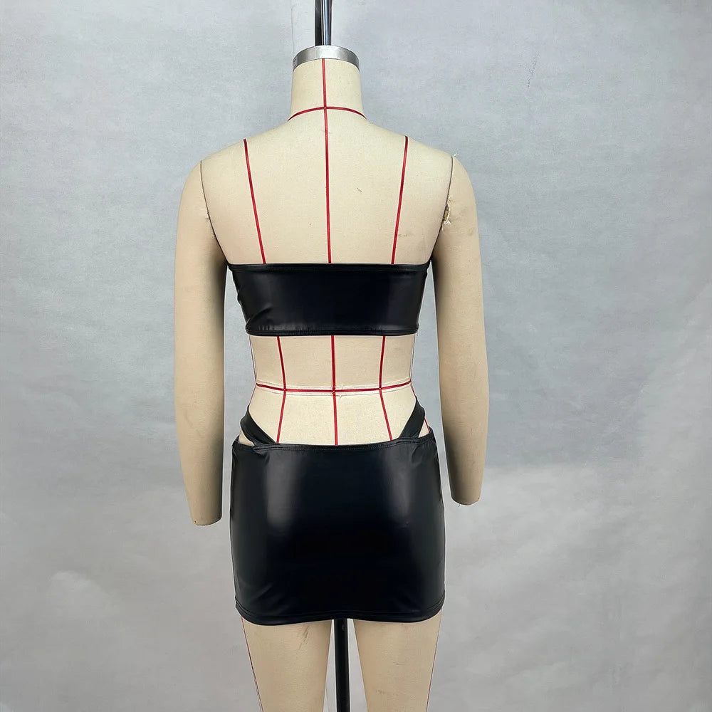 Close-up of a fitted, strapless women's mini dress in vibrant fabric, featuring a sleek, modern design.