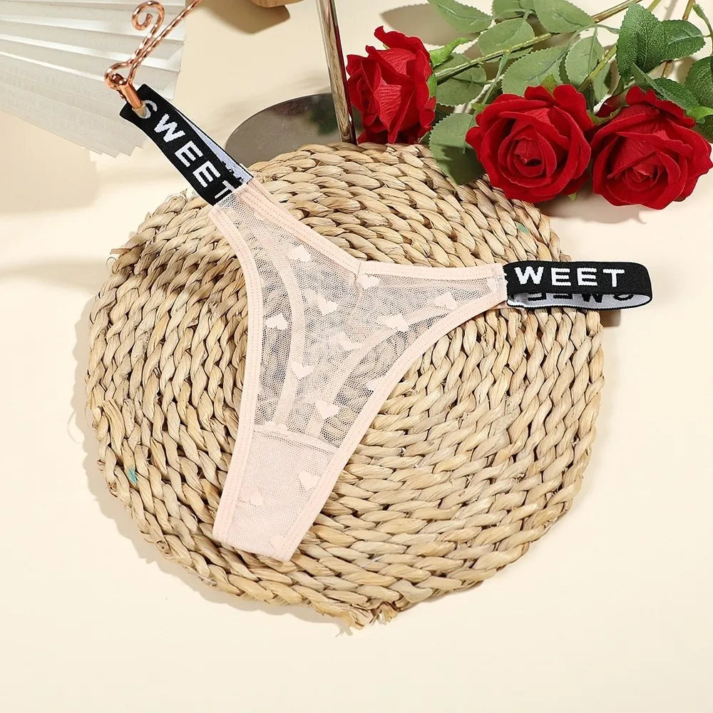 Cotton thong with heart mesh design from Corporación Turística, seamless fit, stylish and comfortable women's underwear.