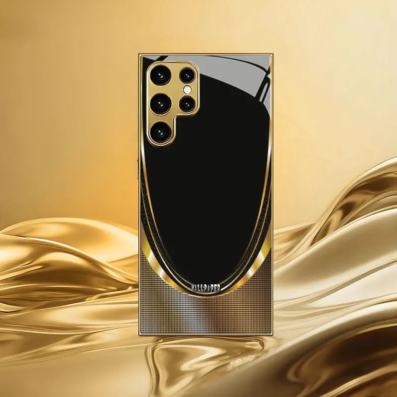 Shiny gold glass phone case for smartphone, featuring a sleek and reflective finish with a protective design.