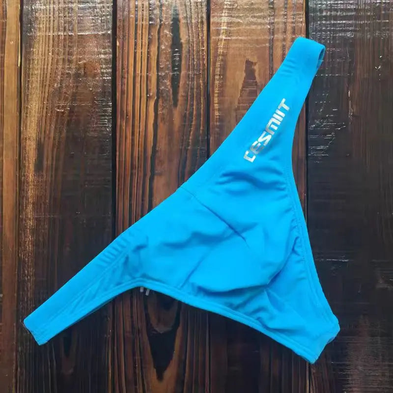 Wholesale 2026 swimwear styles by Corporación Turística featuring variety of designs and vibrant colors for beachwear.
