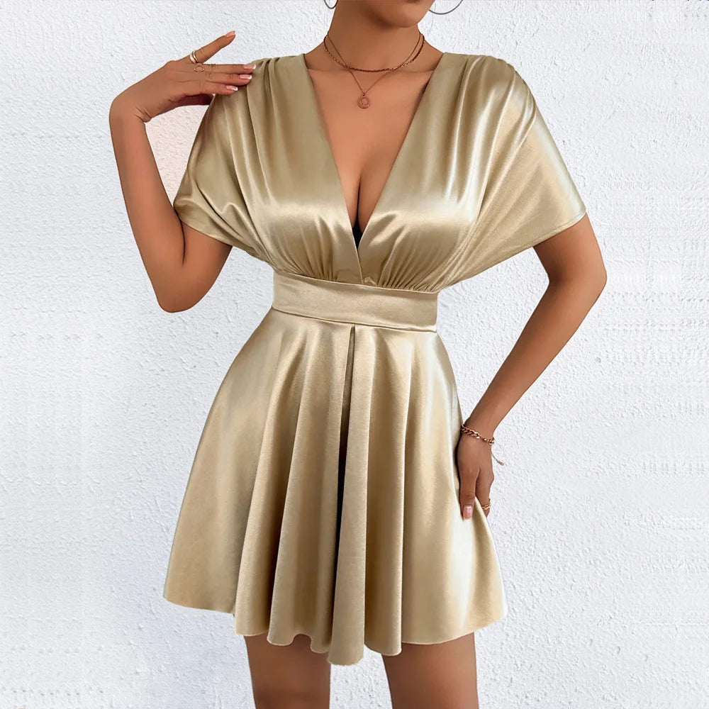 Elegant sexy V-neck dress with low waist from Corporación Turística, featuring a flattering silhouette and stylish design.