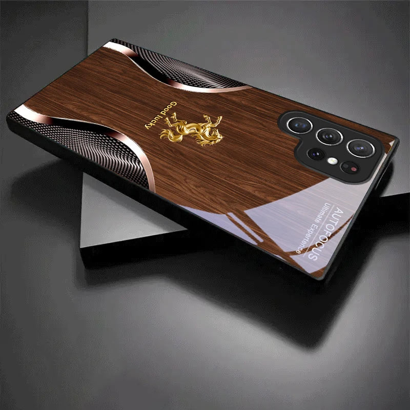 Black crystal phone case with golden steed design from Corporación Turística, showcasing intricate details on the front.