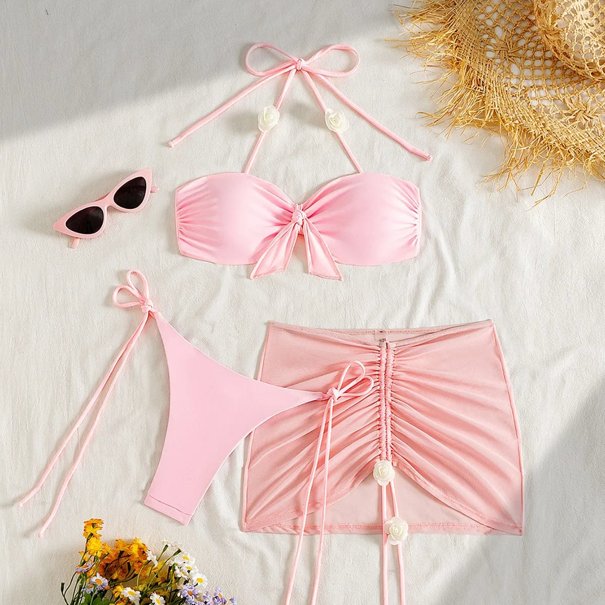 Sexy 3-piece bikini set for women in pink, featuring a stylish top, bottom, and cover-up from Corporación Turística.