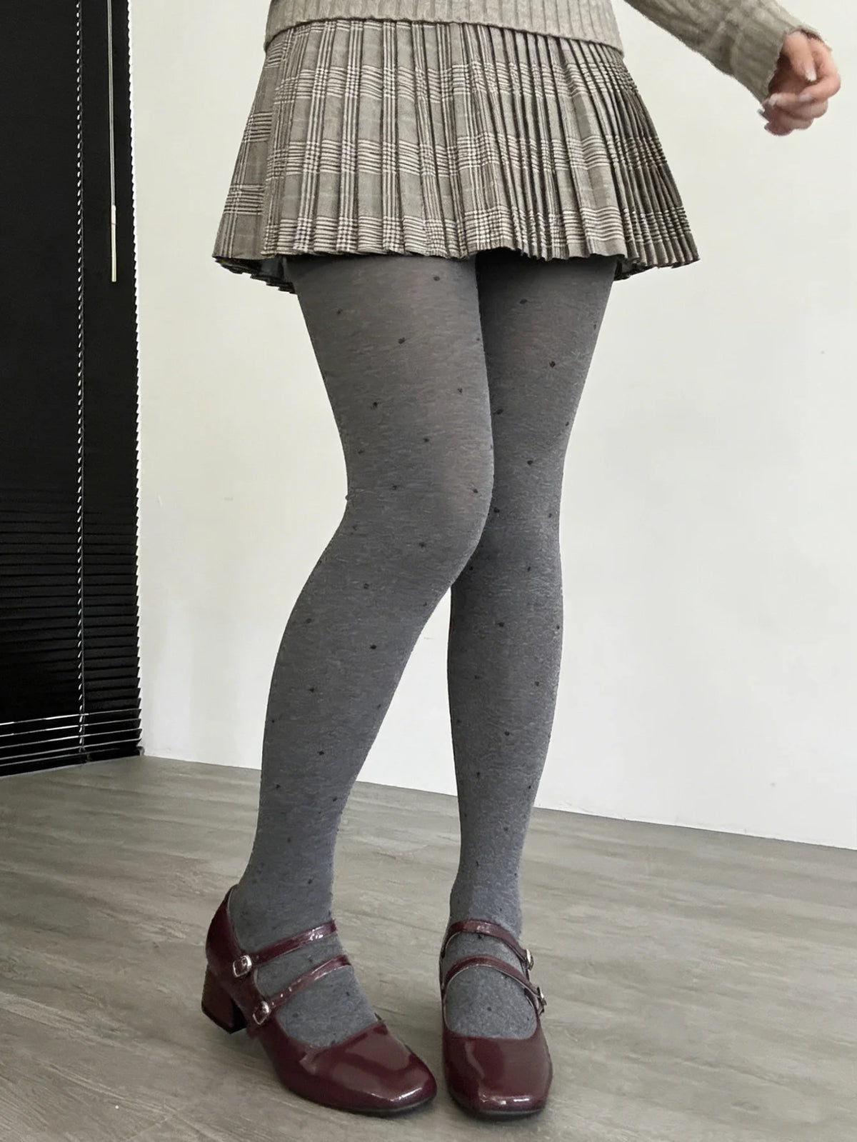Vintage gray knit tights with small dotted patterns, made by Corporación Turística, featuring a classic and cozy design.