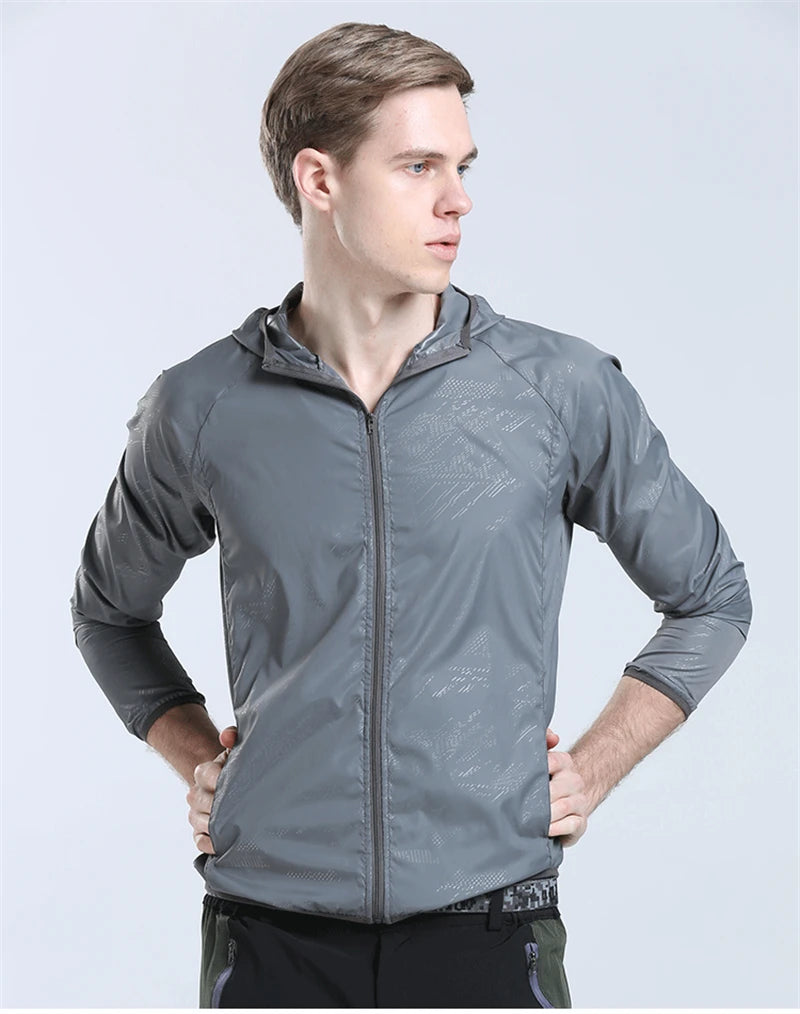 Waterproof camping rain jacket for men and women by Corporación Turística, lightweight outdoor raincoat with adjustable hood.