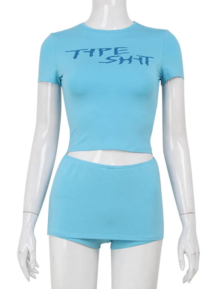 Two-piece short top set with printed letter design from Corporación Turística, featuring colorful, casual summer style.