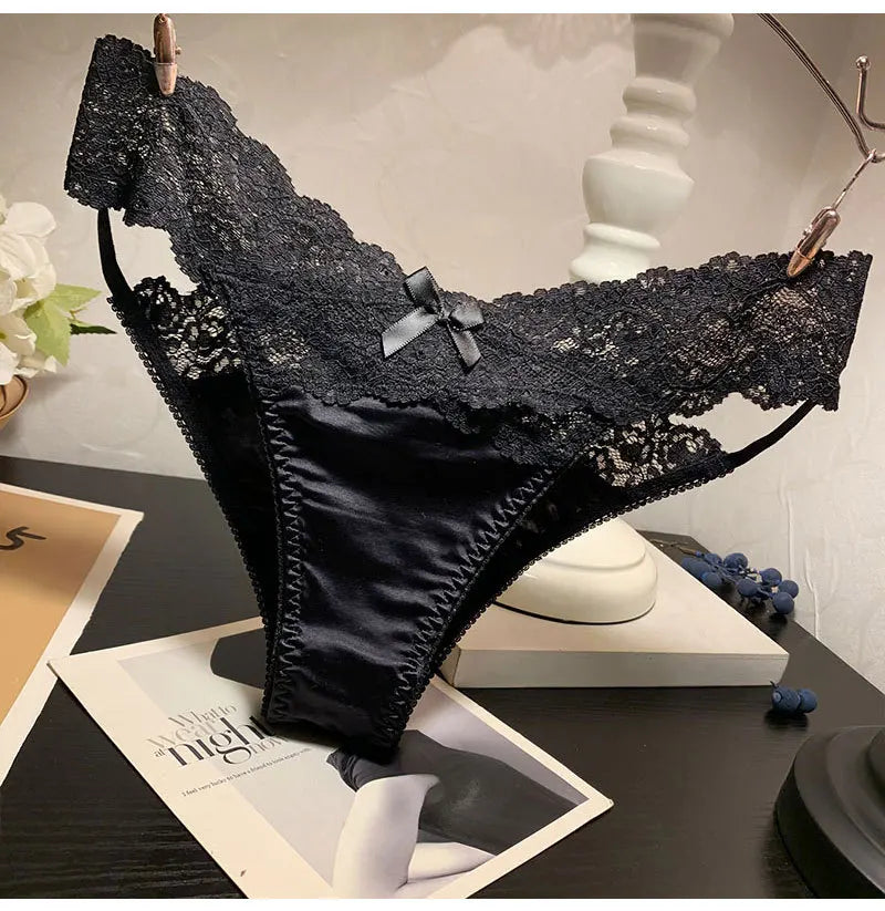 Set of four fashionable satin lace underwear from Corporación Turística, featuring delicate lace detailing and comfortable fit.