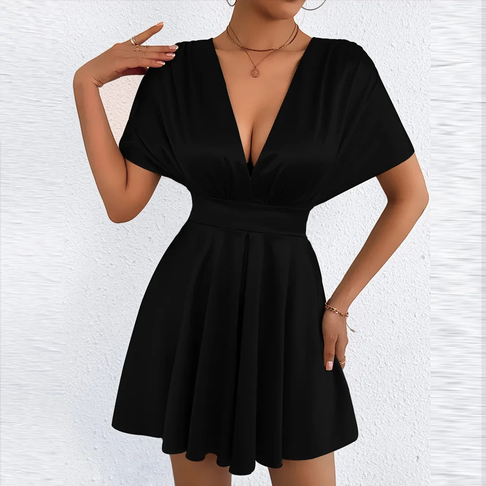 Elegant sexy dress with V-neckline and low waist, featuring smooth fabric and stylish fit, by Corporación Turística.