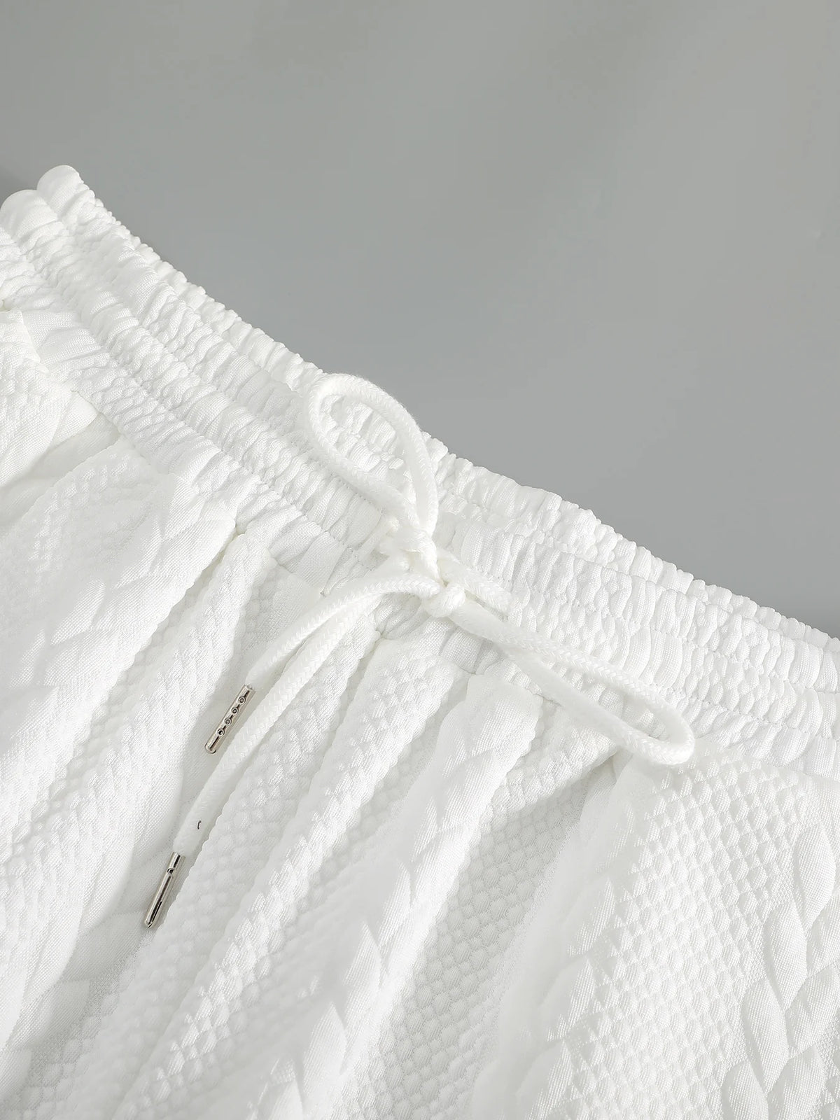 White men's summer breathable shorts by CONJUESS, casual design, 5-inch length, lightweight fabric for warm weather comfort.