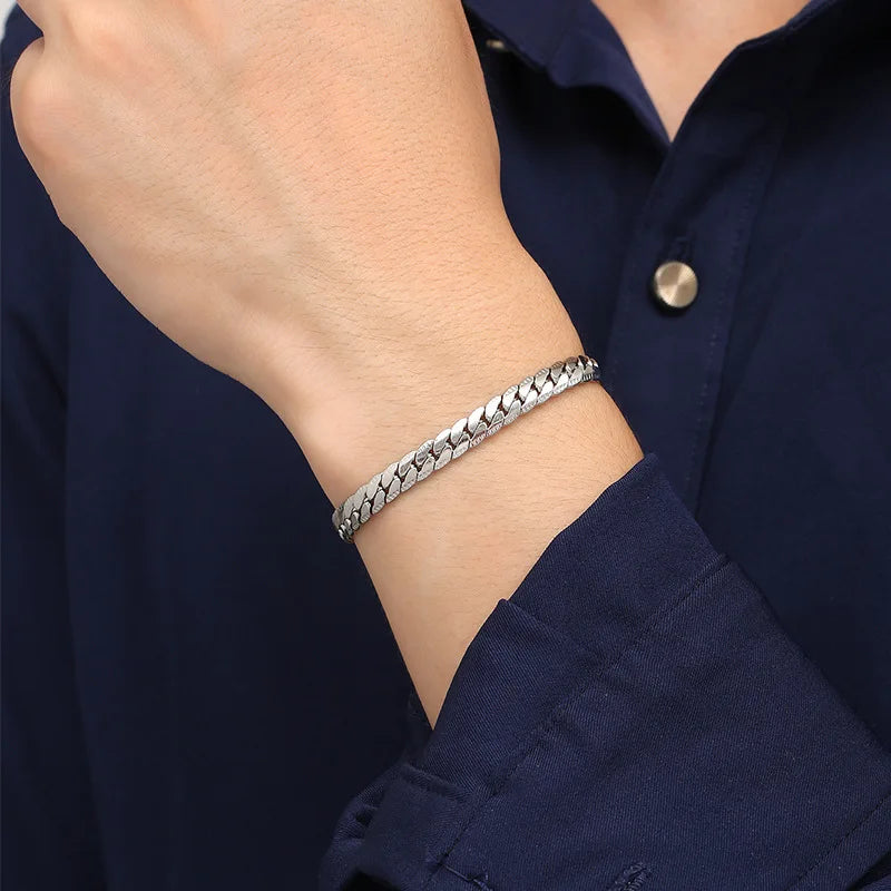 Sterling silver 925 bracelets from Corporación Turística for women and men, featuring sleek designs and polished finishes.