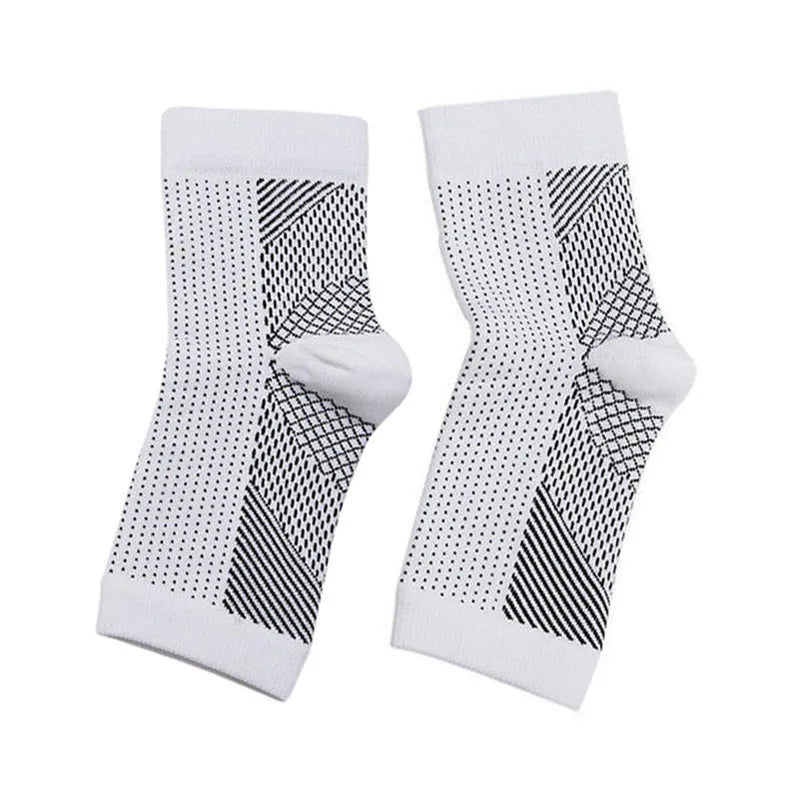 Vita-Wear compression socks for men and women in large and extra-large sizes, from Corporación Turística, shown on a model's legs.