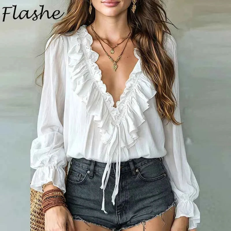 Elegant white long-sleeve blouse for women by Corporación Turística, showing a stylish, fitted design with subtle details.