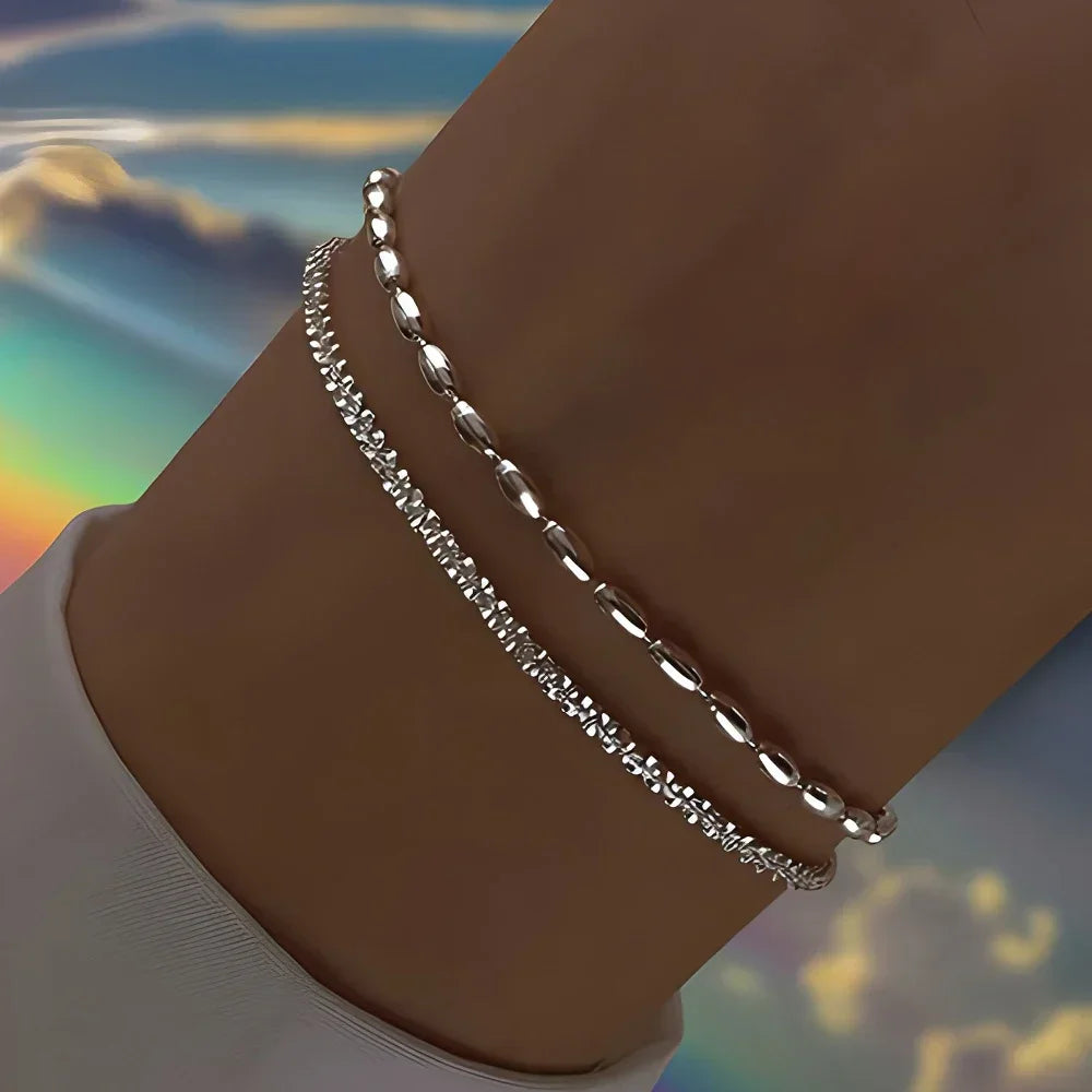 Six imitation diamond silver bracelets from Corporación Turística, featuring sparkling stones on sleek silver bands.