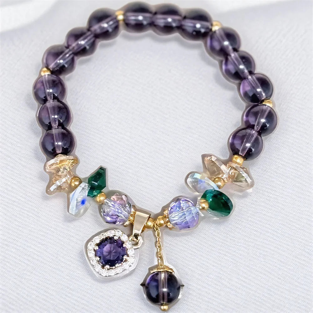Natural purple crystal bead bracelet with intricate design, crafted by Corporación Turística.