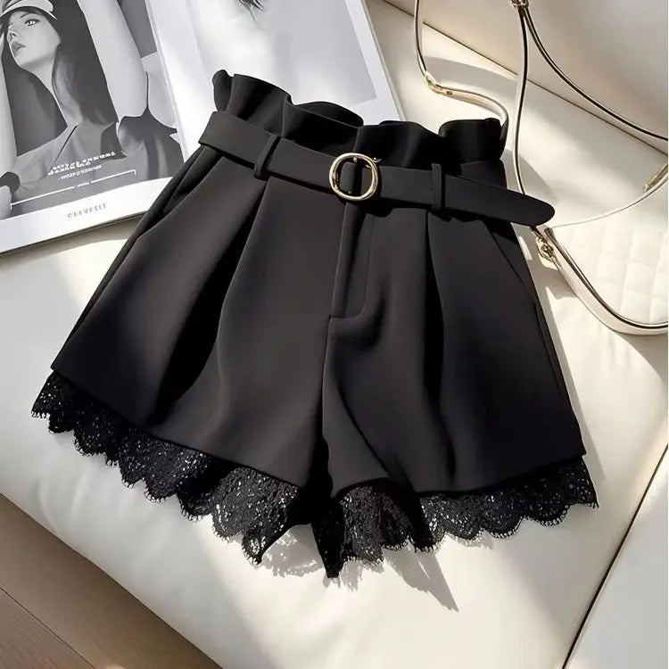 High-waisted black fashion shorts for women by Corporación Turística, slim fit, stylish casual summer wear, front view.