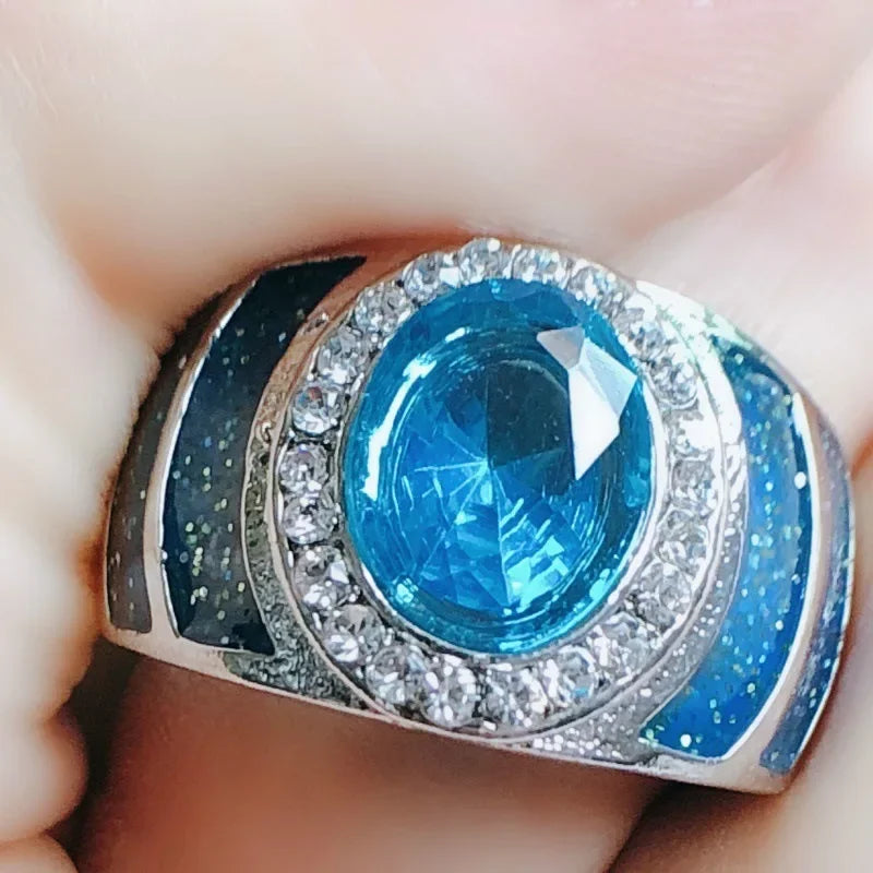 Oval sterling silver 925 ring with 1ct 5A cubic zirconia, luxurious jewelry piece showcasing intricate design.