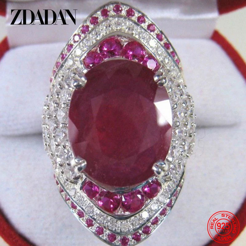 Sterling silver 925 ring with a ruby for women, featuring a detailed design and polished finish.
