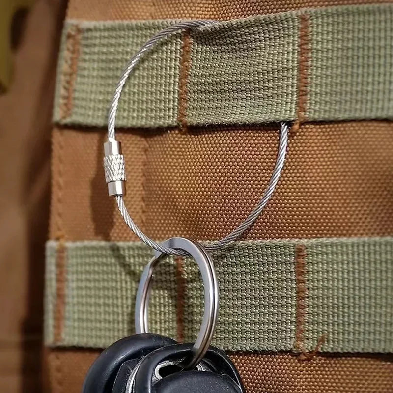 Set of 10 silver metal keychains with steel cable cords, 2mm diameter and 15cm length, for attaching tags and labels.
