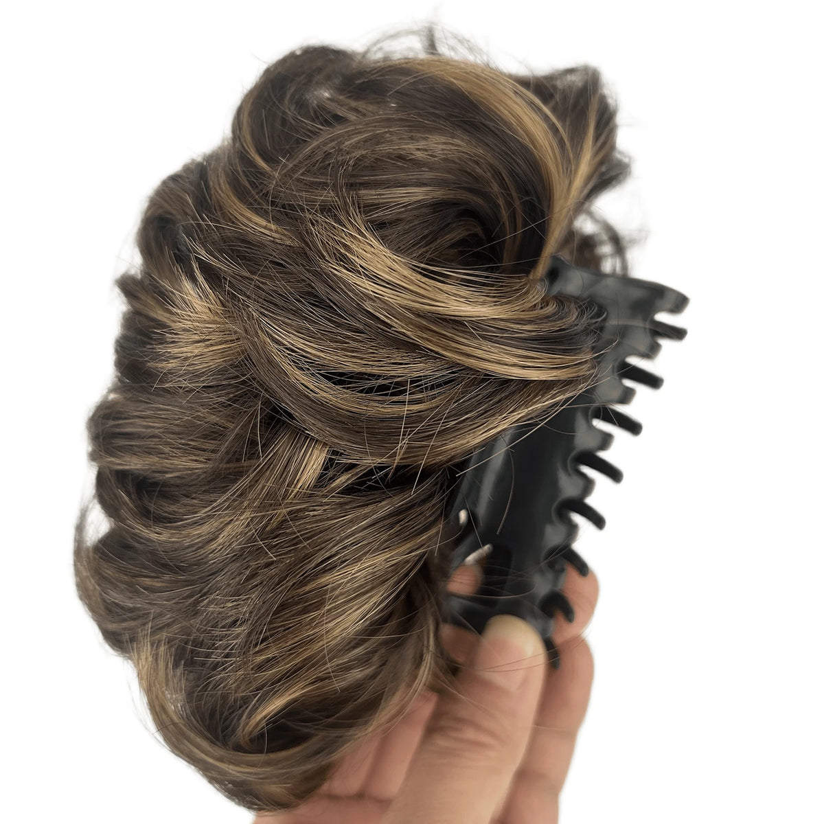 Disheveled hair bun clip accessory from Corporación Turística, featuring a claw clip for messy hairstyles.