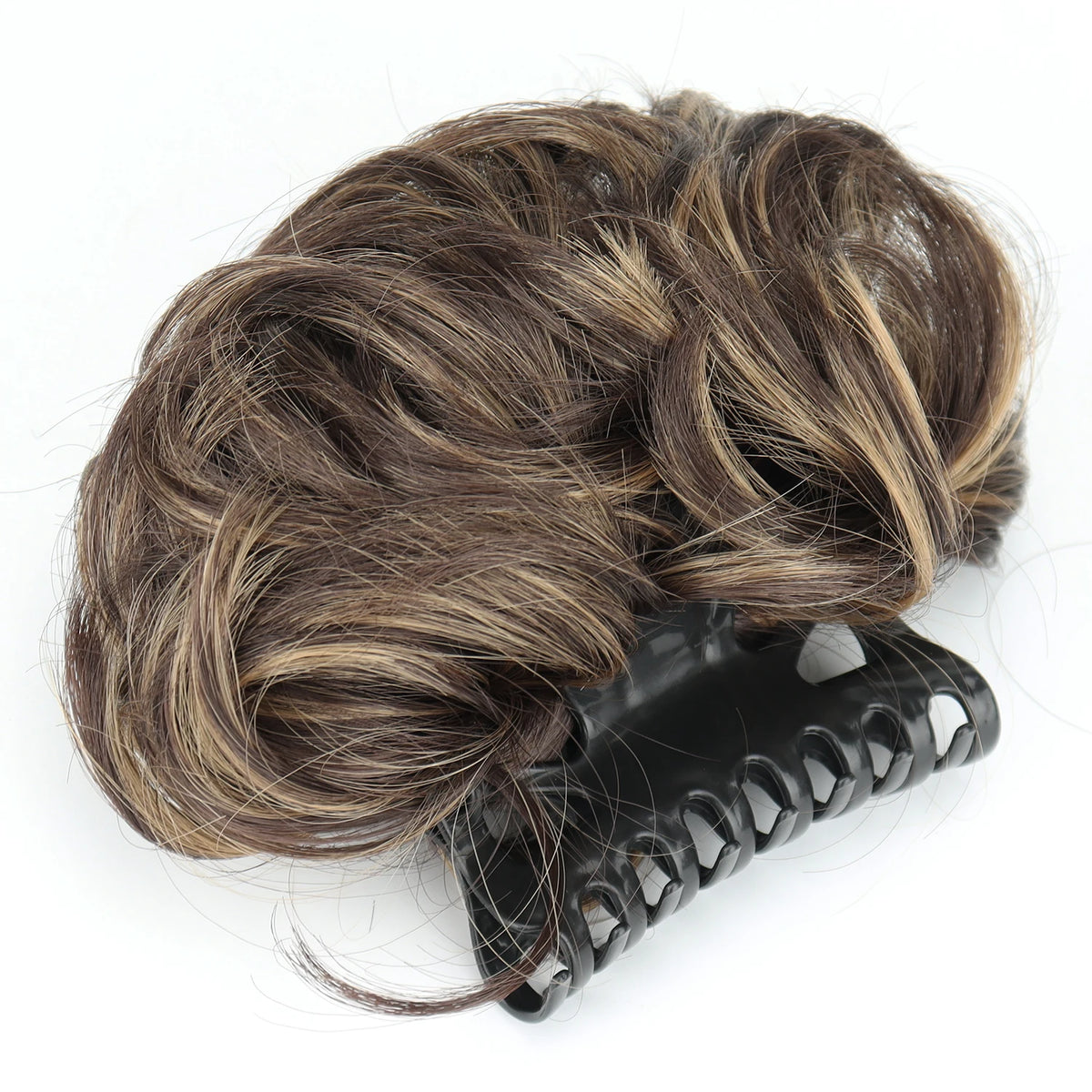 Disheveled hair bun clip accessory by Corporación Turística, styled in a messy, casual look with a claw clip for hair.