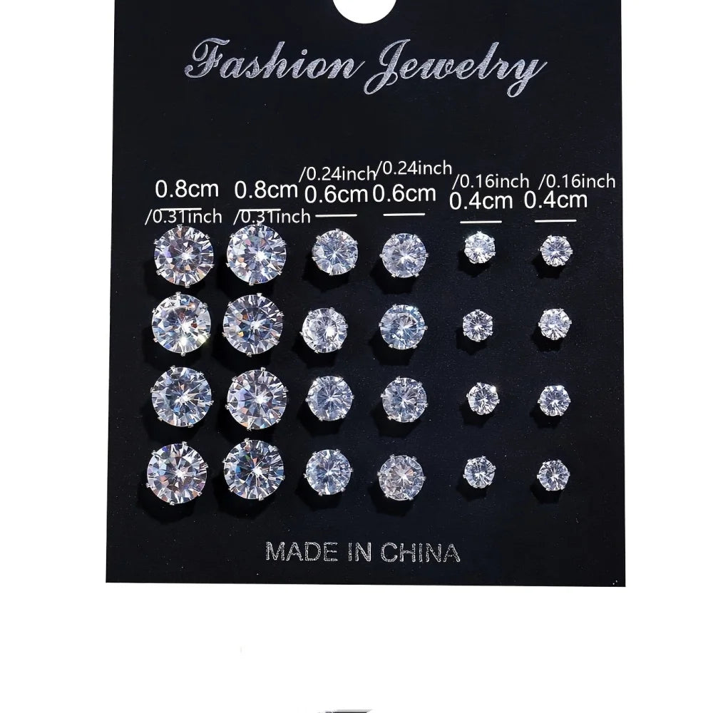 Set of 12 pairs of zirconia screw earrings by Corporación Turística, featuring shiny, silver-tone jewelry with secure screw-back design.