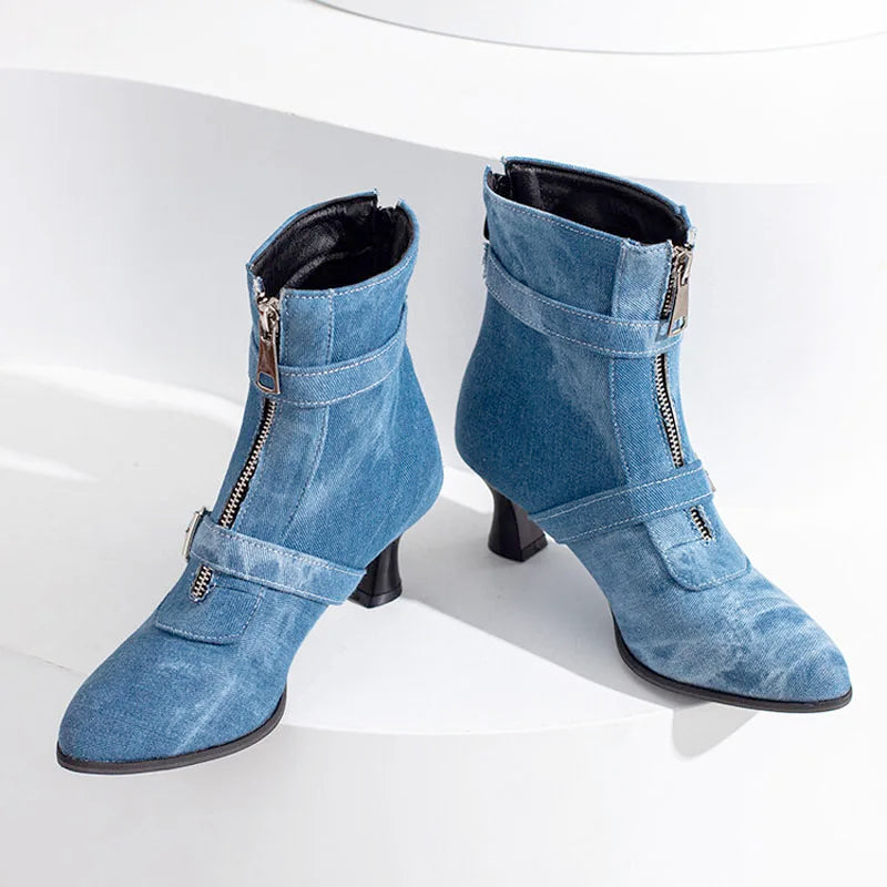 White women's chunky heel ankle boots by Corporación Turística, stylish winter shoes with thick heels and cozy design.