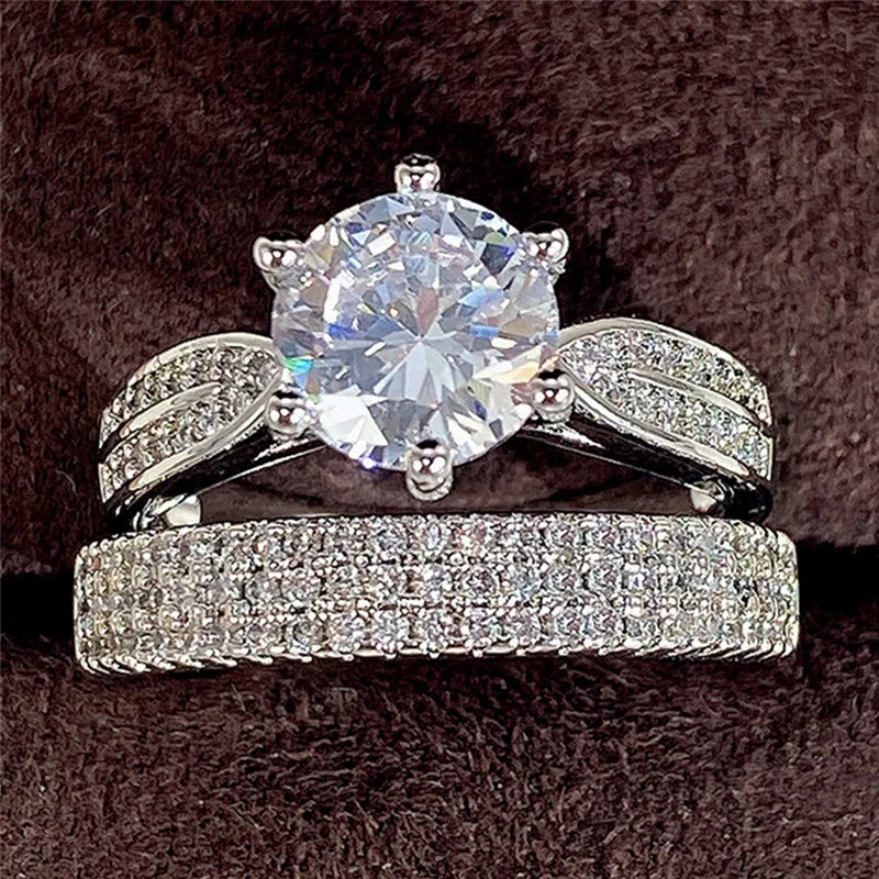 Set of sterling silver 925 rings for women with circus-inspired designs, featuring multiple band styles and intricate detailing.