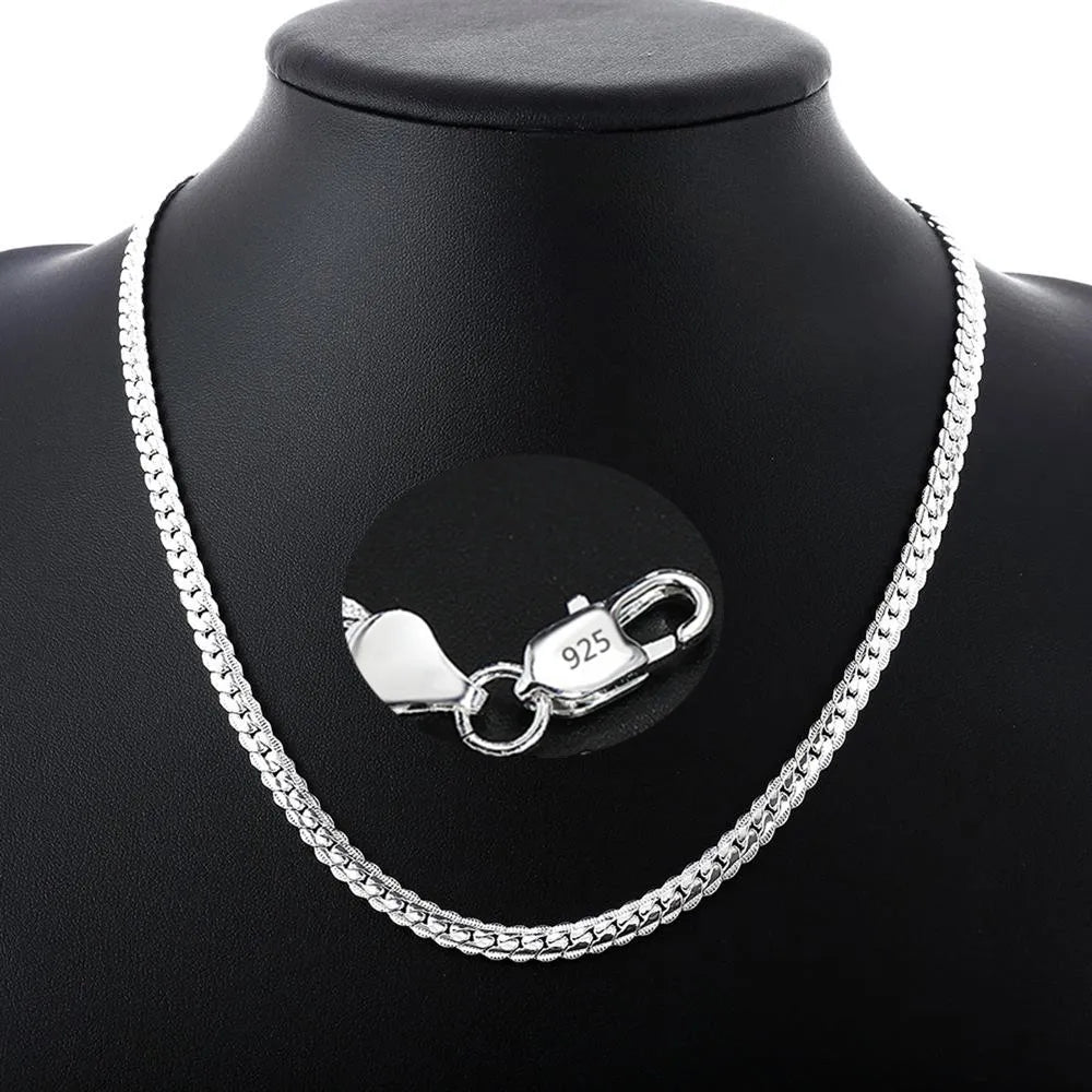Fine Brands sterling silver jewelry set with necklace and bracelet, featuring intricate designs and polished silver finish.