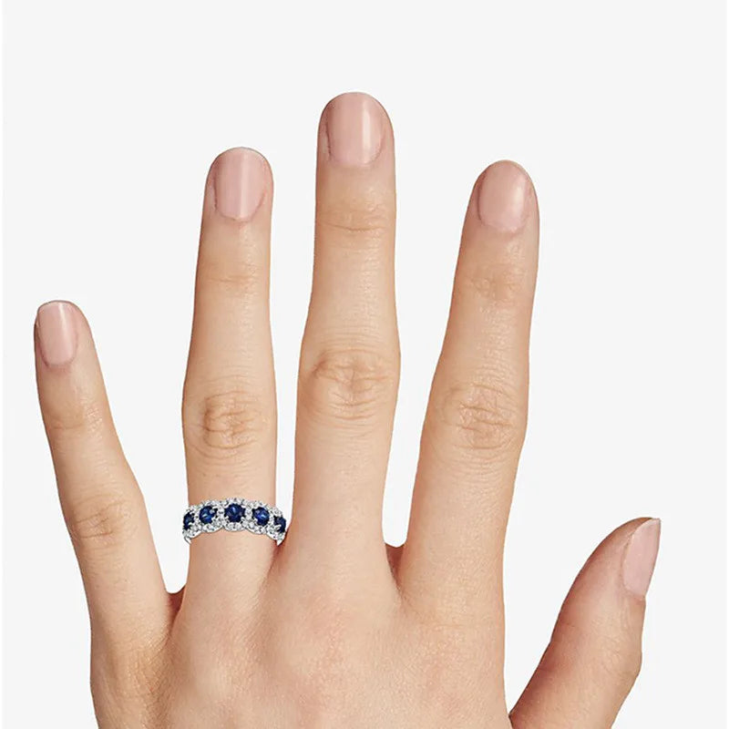 Elegant sterling silver 925 women's ring with intricate design, showcasing a polished finish and stylish craftsmanship.