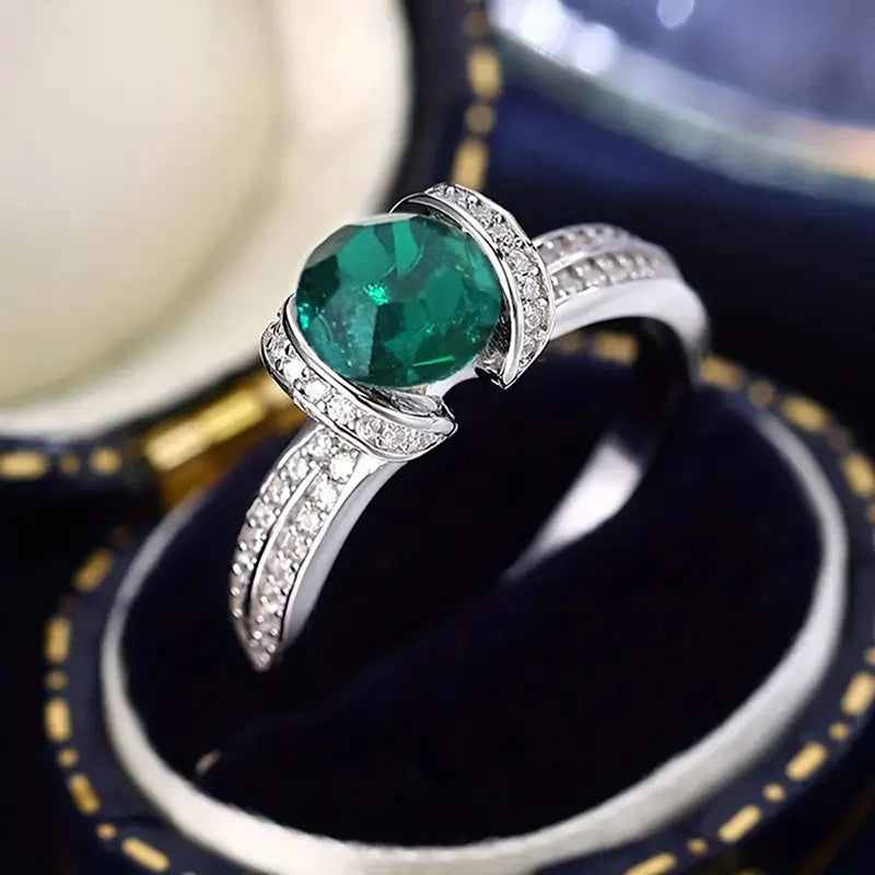 Silver 925 green cubic zirconia ring with band design, stylish jewelry piece from Corporación Turística.