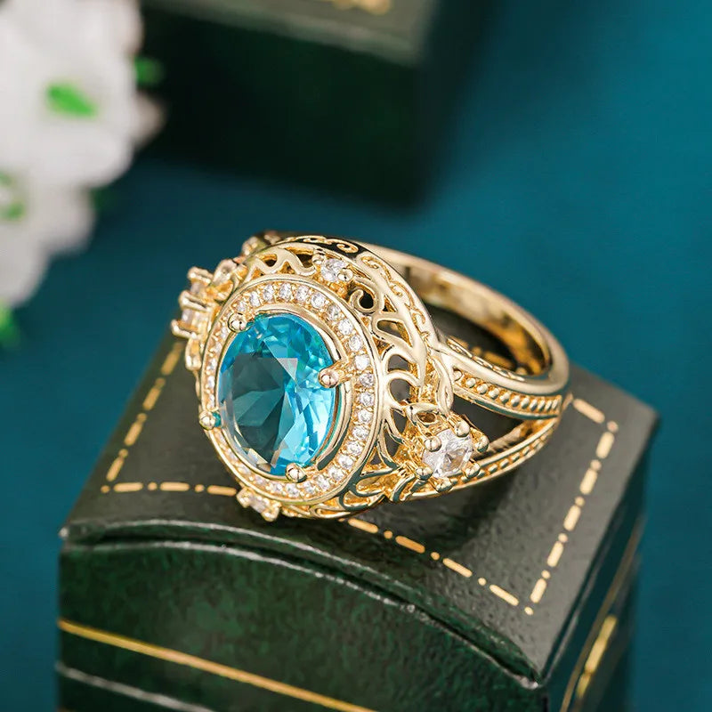 Sterling silver 925 ring with blue cubic zirconia and Vin design, featuring a detailed, elegant jewelry style.